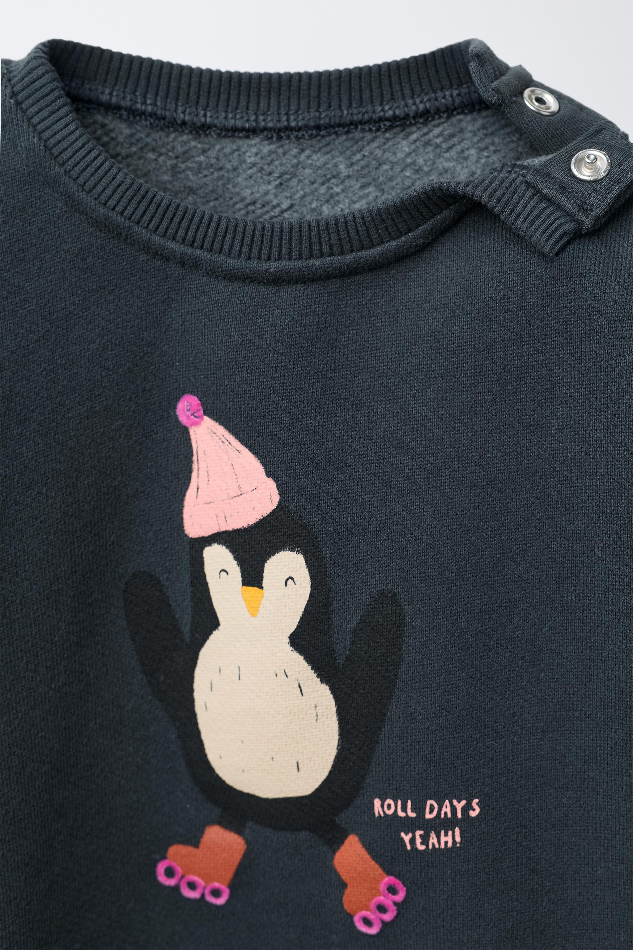 PENGUIN PRINT SWEATSHIRT
